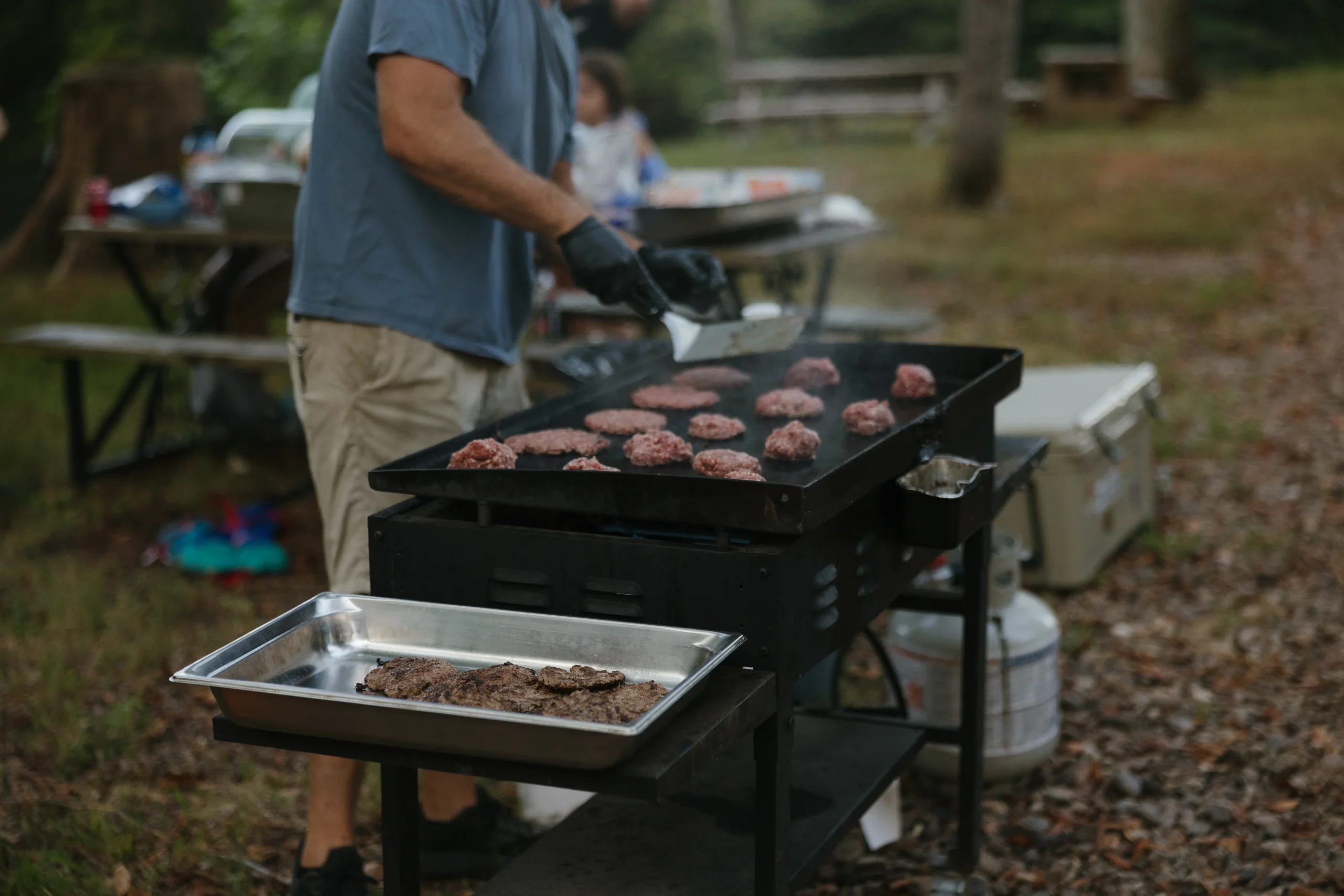 Guests grilling dinner at Riverbend Ranch
